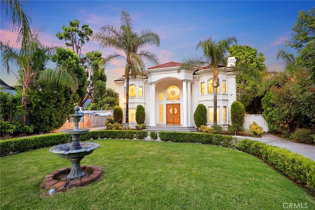 1118 S 6th Ave, Arcadia, CA 91006 - mediterranean / spanish home featuring stucco siding, a lawn, and a tiled roof