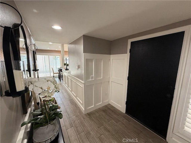 1053 Border Ave, Corona, CA 92882 - bathroom with a decorative wall, a wainscoted wall, wood finished floors, and recessed lighting