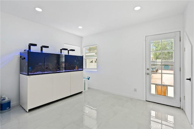 1381 W Summerland Ave, San Pedro, CA 90732 - interior space with light marble finish flooring and recessed lighting