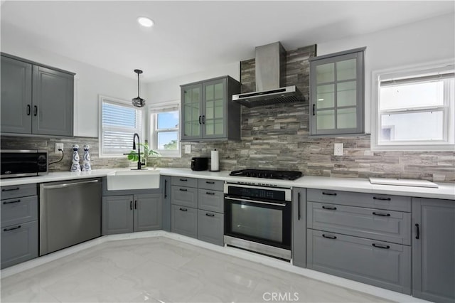 1381 W Summerland Ave, San Pedro, CA 90732 - kitchen with stainless steel appliances, gray cabinetry, wall chimney range hood, and recessed lighting