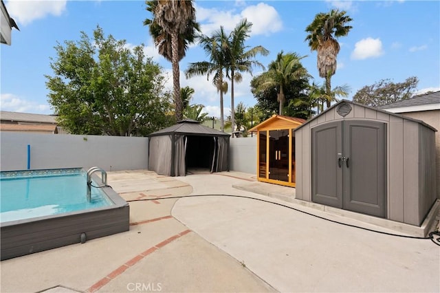 1381 W Summerland Ave, San Pedro, CA 90732 - view of swimming pool featuring a gazebo, a shed, a patio, and a fenced backyard