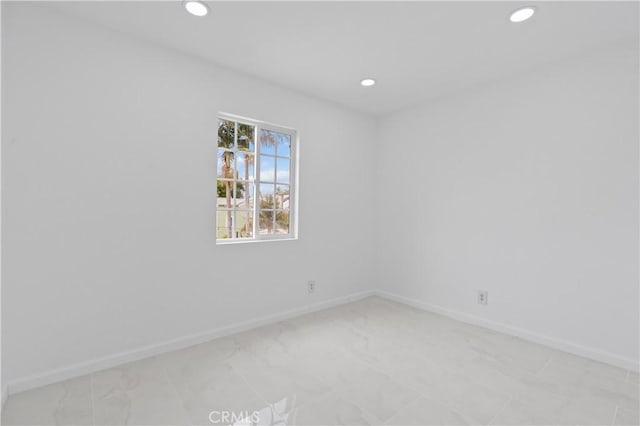 1381 W Summerland Ave, San Pedro, CA 90732 - empty room with recessed lighting and light marble finish floors