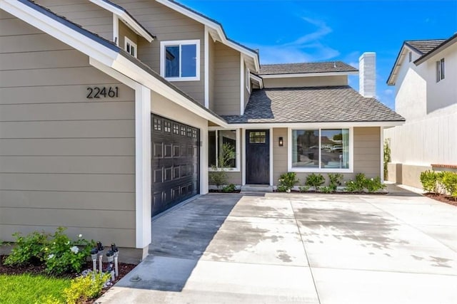 22461 Silver Spur, Lake Forest, CA 92630 - entrance to property with a chimney and concrete driveway