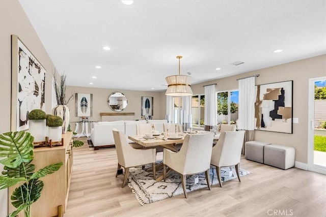 22461 Silver Spur, Lake Forest, CA 92630 - dining area with light wood-style floors and recessed lighting