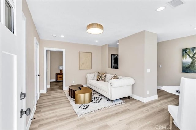 22461 Silver Spur, Lake Forest, CA 92630 - living area with light wood-style flooring and recessed lighting