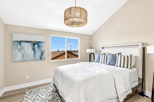 22461 Silver Spur, Lake Forest, CA 92630 - bedroom with wood finished floors and vaulted ceiling