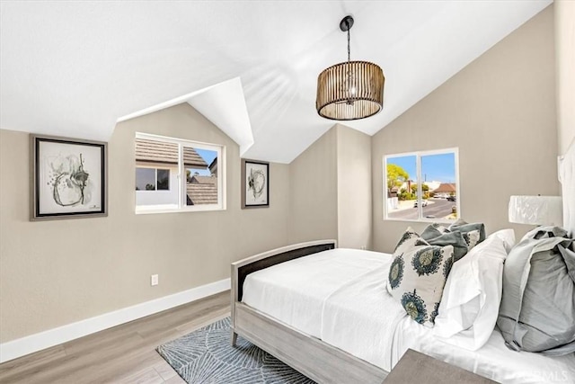 22461 Silver Spur, Lake Forest, CA 92630 - bedroom with vaulted ceiling and wood finished floors