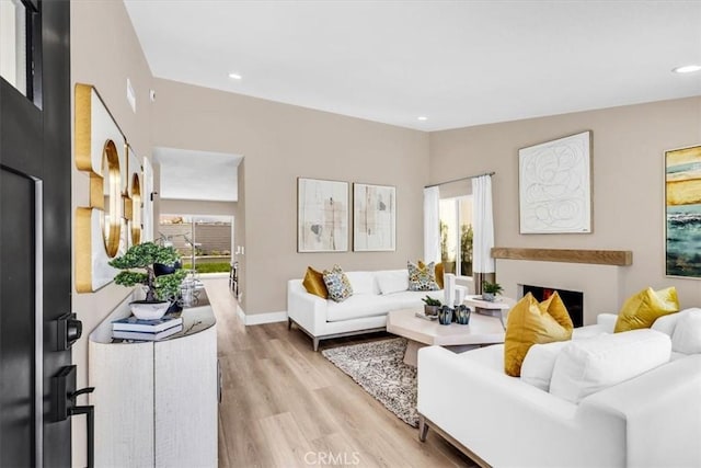22461 Silver Spur, Lake Forest, CA 92630 - living area with light wood-type flooring and recessed lighting