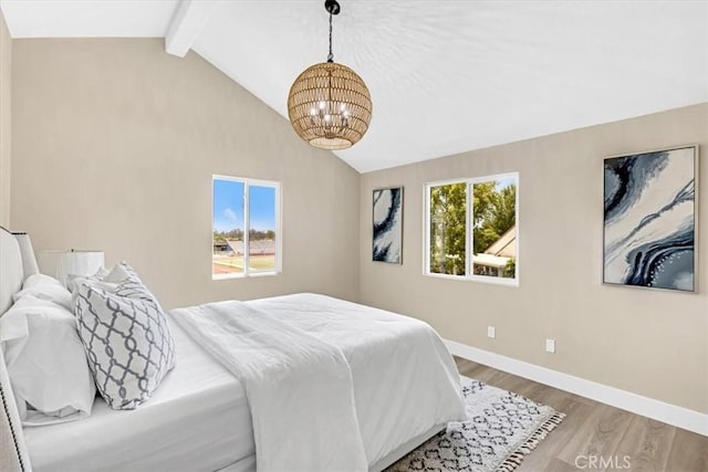 22461 Silver Spur, Lake Forest, CA 92630 - bedroom featuring a chandelier, wood finished floors, beam ceiling, and high vaulted ceiling