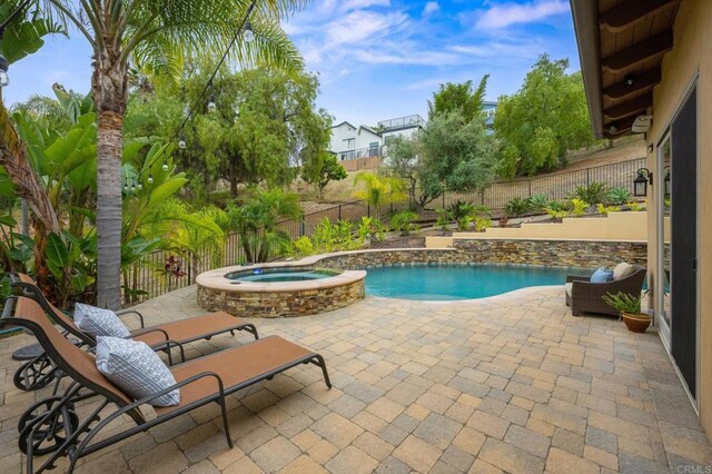 4149 Manchester Ave, Encinitas, CA 92024 - view of pool featuring a patio, a fenced backyard, and a pool with connected hot tub