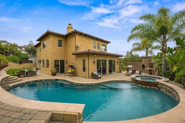 4149 Manchester Ave, Encinitas, CA 92024 - view of swimming pool featuring a patio area, a pool with connected hot tub, and outdoor dining area