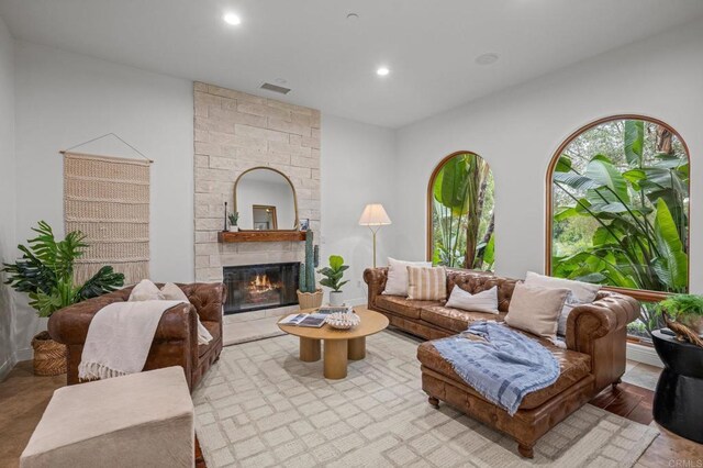 4149 Manchester Ave, Encinitas, CA 92024 - living room featuring a large fireplace, recessed lighting, and wood finished floors
