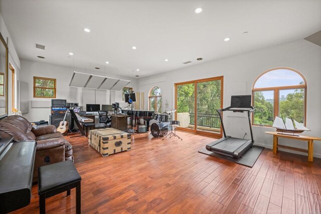 4149 Manchester Ave, Encinitas, CA 92024 - living room featuring healthy amount of natural light, wood finished floors, recessed lighting, and a desk