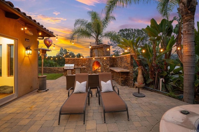 4149 Manchester Ave, Encinitas, CA 92024 - view of patio with an outdoor stone fireplace and area for grilling