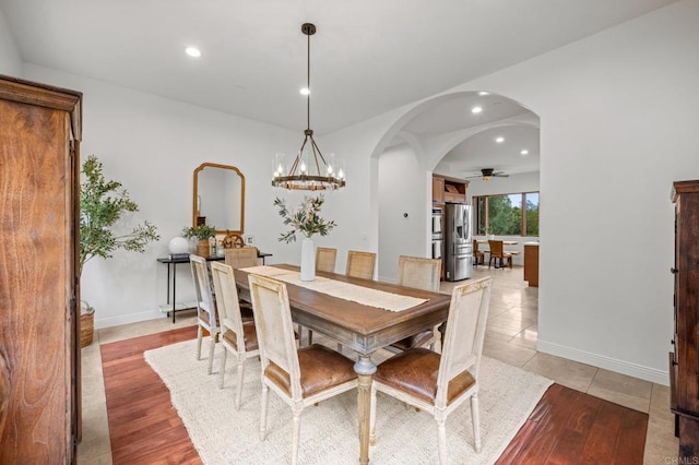 4149 Manchester Ave, Encinitas, CA 92024 - dining area featuring a ceiling fan, recessed lighting, arched walkways, and a chandelier