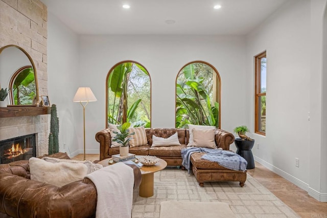 4149 Manchester Ave, Encinitas, CA 92024 - living room with healthy amount of natural light, recessed lighting, and a fireplace