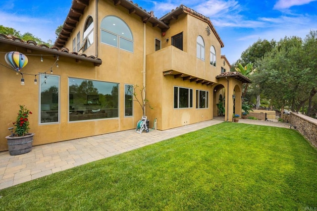 4149 Manchester Ave, Encinitas, CA 92024 - rear view of property featuring stucco siding, a patio area, and a balcony