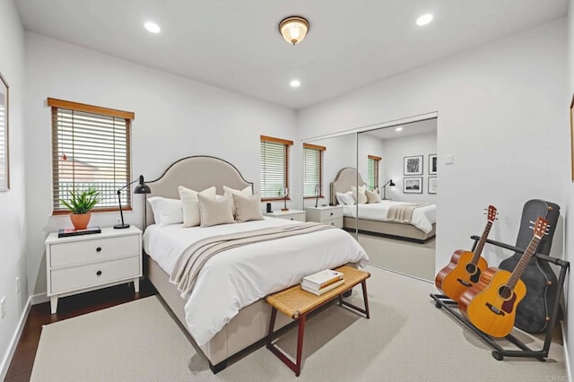 4149 Manchester Ave, Encinitas, CA 92024 - bedroom featuring recessed lighting, multiple windows, dark wood-style floors, and a closet