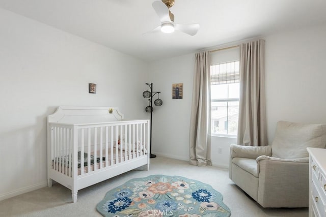 874 Royal Knight Trl, Redlands, CA 92374 - bedroom featuring light colored carpet, ceiling fan, and a nursery area