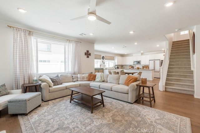 874 Royal Knight Trl, Redlands, CA 92374 - living area featuring light wood-type flooring, stairway, recessed lighting, and a ceiling fan