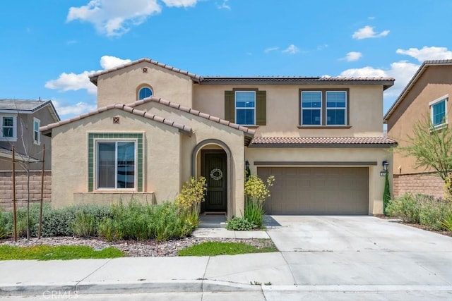 874 Royal Knight Trl, Redlands, CA 92374 - mediterranean / spanish home with stucco siding, a tile roof, a garage, and driveway