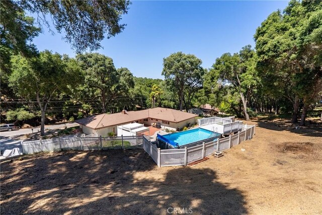 7735 Del Rio Rd, Atascadero, CA 93422 - view of swimming pool with a fenced backyard