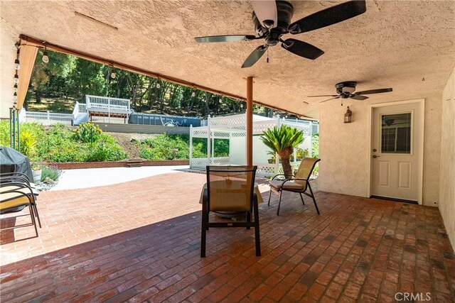 7735 Del Rio Rd, Atascadero, CA 93422 - view of patio with ceiling fan and outdoor dining space