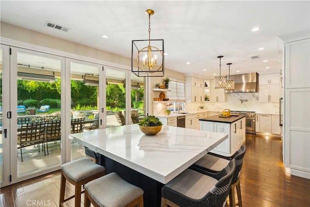 2937 Arboridge Ct, Fullerton, CA 92835 - dining room featuring a chandelier, plenty of natural light, dark wood-style flooring, and recessed lighting