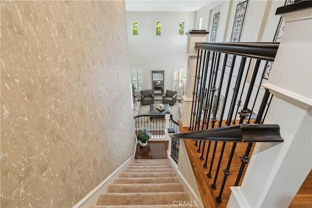 2937 Arboridge Ct, Fullerton, CA 92835 - staircase featuring healthy amount of natural light and a towering ceiling