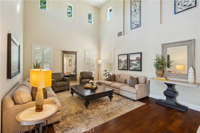 2937 Arboridge Ct, Fullerton, CA 92835 - living area with dark wood-style floors, healthy amount of natural light, and a high ceiling