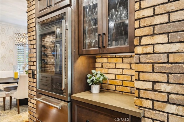 2937 Arboridge Ct, Fullerton, CA 92835 - detailed view of wallpapered walls, dark brown cabinets, refrigerator, glass insert cabinets, and light countertops
