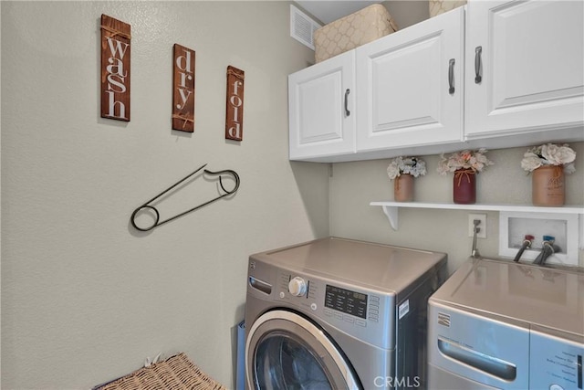 16315 Yorba Linda Ln, Fontana, CA 92336 - laundry room with cabinet space and washer and dryer