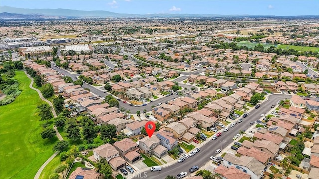 16315 Yorba Linda Ln, Fontana, CA 92336 - aerial view of property's location with nearby suburban area and a mountainous background