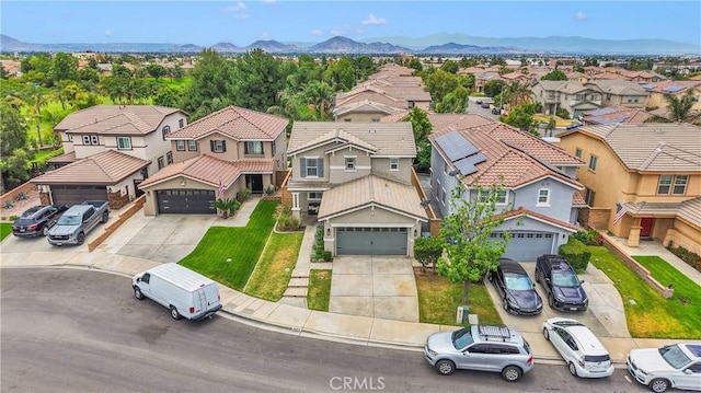 16315 Yorba Linda Ln, Fontana, CA 92336 - aerial perspective of suburban area featuring a mountain backdrop