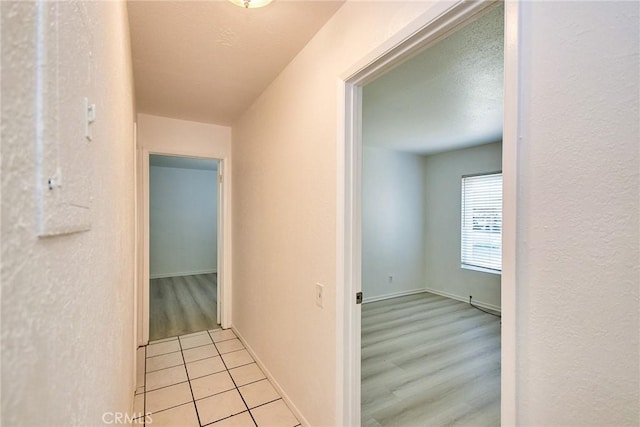 212 S Kraemer Blvd Unit 1205, Placentia, CA 92870 - hallway with tile patterned floors and baseboards
