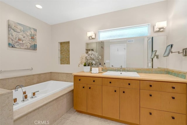 252 W 15th St, Upland, CA 91786 - full bathroom featuring vanity, a garden tub, and tile patterned floors
