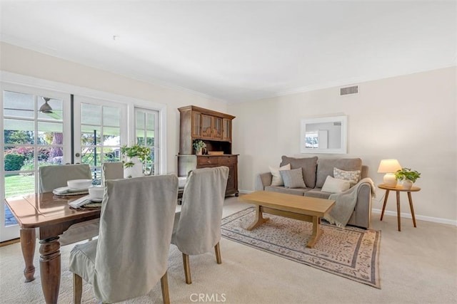 252 W 15th St, Upland, CA 91786 - dining space featuring light colored carpet and crown molding