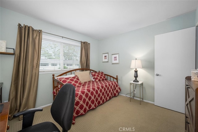 9676 Bloomfield St, Cypress, CA 90630 - carpeted bedroom featuring a desk and baseboards