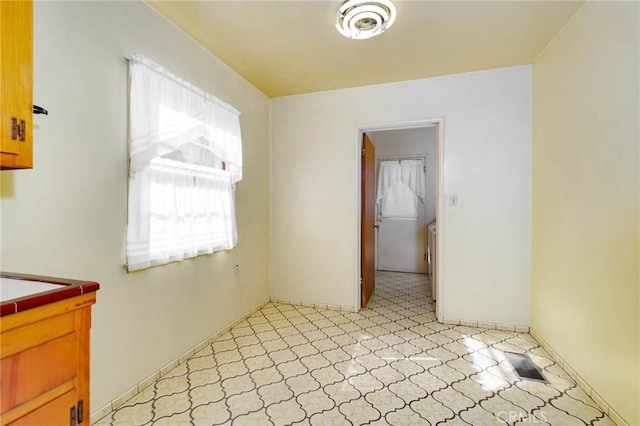 11701 Roseglen St, El Monte, CA 91732 - unfurnished dining area featuring light flooring