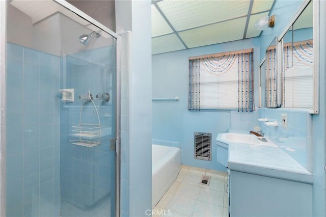 11701 Roseglen St, El Monte, CA 91732 - full bathroom featuring a bath, vanity, a stall shower, and tile patterned flooring