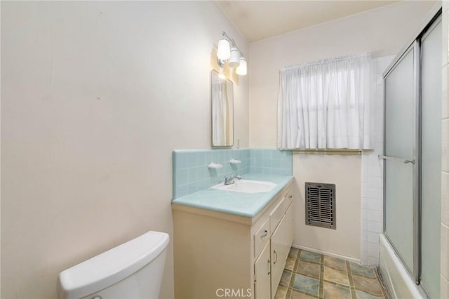 11701 Roseglen St, El Monte, CA 91732 - full bath featuring vanity, backsplash, and enclosed tub / shower combo
