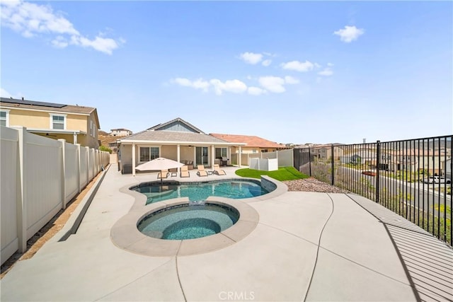 45105 Quicksilver Rd, Lake Elsinore, CA 92532 - view of swimming pool featuring a patio, a fenced backyard, and a pool with connected hot tub
