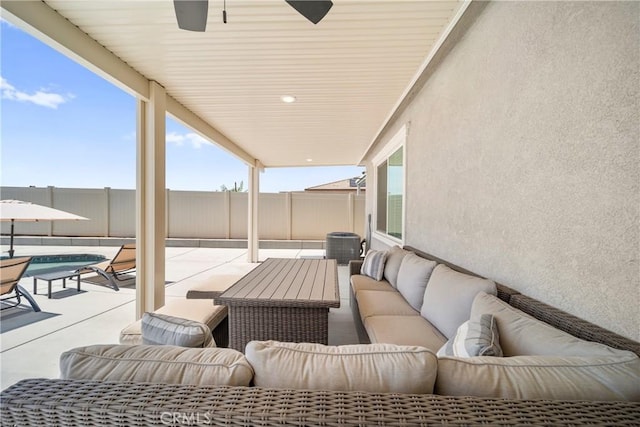 45105 Quicksilver Rd, Lake Elsinore, CA 92532 - fenced backyard featuring an outdoor hangout area, a patio, a pool, and a ceiling fan