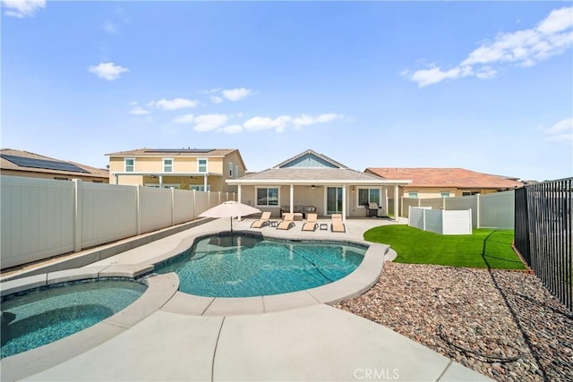 45105 Quicksilver Rd, Lake Elsinore, CA 92532 - view of swimming pool with a fenced backyard, a patio area, a pool with connected hot tub, and an outdoor hangout area