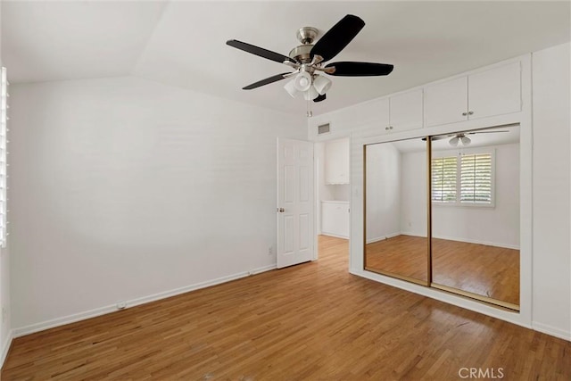 9508 Jellico Ave, Northridge, CA 91325 - unfurnished bedroom featuring light wood finished floors, a closet, vaulted ceiling, and ceiling fan