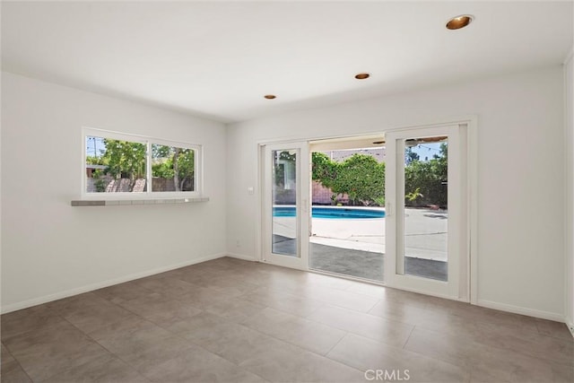 9508 Jellico Ave, Northridge, CA 91325 - empty room featuring recessed lighting and tile patterned floors