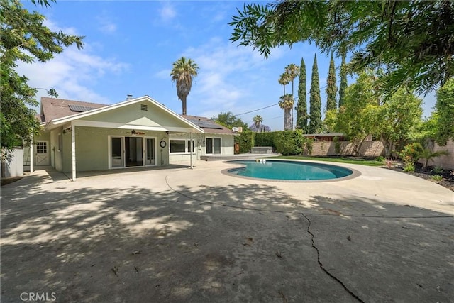 9508 Jellico Ave, Northridge, CA 91325 - view of pool featuring ceiling fan, a patio area, and a fenced backyard