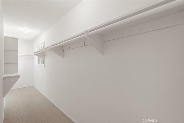 9508 Jellico Ave, Northridge, CA 91325 - walk in closet featuring light flooring