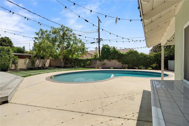 9508 Jellico Ave, Northridge, CA 91325 - view of swimming pool featuring a fenced backyard and a patio