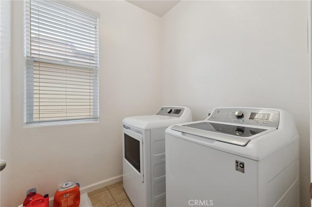 5529 N Valdez, Fresno, CA 93722 - laundry area with separate washer and dryer and light tile patterned floors